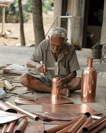 Copper Artist making copper bottle